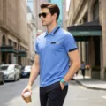 Men casual short sleeve polo shirt outdoor street scene detail view with button lapel. - Sapphire Blue