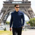 Detailed showcase of men's dark blue long-sleeve linen shirt in a Paris street setting. - Navy Blue