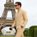 Outdoor detail shot of men's linen long sleeve shirt pocket style resort wear casual business. - Khaki
