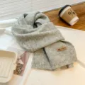 Cozy grey knitted scarf for women and men, winter warm soft neck warmer fashion accessory. - Light Gray