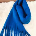 Blue mohair winter scarf detail view, cozy thickened tassel design for cold weather warmth. - Blue