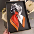 Elegant color block silk square scarf, featuring chic contrast design and smooth fabric. - Orange