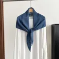 Blue hollow knit triangular shawl scarf paired with white top, elegant wool blend outerwear piece. - 145*42cm / Dark Blue