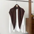 Brown wool-blend hollow knit triangular scarf shawl detail, elegant winter accessory. - Brown