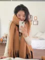 Thick mohair winter scarf detail view, cozy knitted tassel design in solid camel color. - Coffee