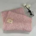 Soft thick knit pink winter scarf detail view with cute woven label and cozy texture - 220cm / Lotus Pink
