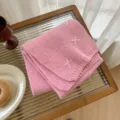 Pink knitted wool blend scarf detail, cozy winter neck wrap with white cross embroidery. - Pink