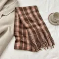 Close-up detail of autumn winter brown plaid imitation cashmere scarf with soft tassels. - No. 1 / 180cm
