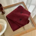 Cozy wool blend knit scarf in dark red with cute bow details, warm and stylish winter accessory. - Burgundy
