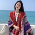 Colorful knitted ethnic cape for women, stylish patterned cozy winter autumn outdoor shawl. - Red