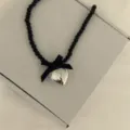 Chic black beaded necklace with cute ribbon bow and silver heart pendant for sweet summer style. - Heart And Bow / Black