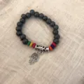 Ethnic bohemian beaded bracelet featuring dark ceramic beads, colorful wooden accents and charm. - Style 1