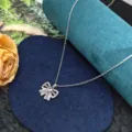 Exquisite hollow bow clavicle chain necklace with sparkling pink crystal stone details. - Butterfly Style X1295