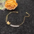 Elegante bracciale con farfalla placcato in oro con pietre di zircone scintillanti per donne e ragazze. - Bracciale Giuntato a Farfalla Smerigliata / Oro