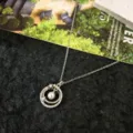 Exquisite silver necklace featuring a double ring zircon pendant and delicate pearl charm for women. - Pearl Wreath Necklace