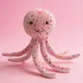 Peluche polpo rosa con stelle lucide, simpatico animale imbottito portachiavi per borsa donna. - Stella Rosa Chiaro