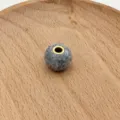 Grey felt bead detail close up, golden brass core hole, handmade DIY jewelry accessory part. - 14