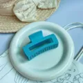Morsetto per capelli quadrato blu opaco da donna elegante variante vista prodotto. - Pinza Quadrata / 8 cm Medio / Celeste