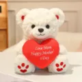 Cute white plush teddy bear holding a red heart pillow with Mother's Day embroidery. - 26cm / White Bear