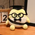 Niedliches Plüschtier als gekochtes Ei mit Doktorhut und Brille für Kinder zum Kuscheln - Gelb - Schwarze Schärpe Stil / Gelb / 15cm