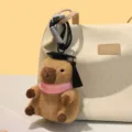 Süßes Wasserschwein Doktor Plüsch Anhänger Abschluss Kuscheltier Tasche Schlüsselanhänger - Rosa Schal Stil