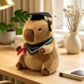 Cute graduation capybara plush toy, soft stuffed animal doll wearing academic cap and scarf. - Green Triangle Scarf Style