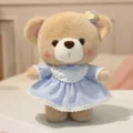 Cute plush teddy bear toy wearing a lovely blue princess dress with white lace details. - Blue