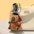 Simpatico capibara peluche ciondolo cappello da dottore peluche borsa portachiavi accessorio - Stile Fascia Nero Rossa