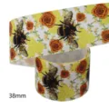 38mm grosgrain ribbon roll with bee and rose print, perfect for DIY crafts and hair accessories. - Bee Rose Honeycomb Pattern (M-21413-450)