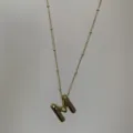 Gouden initiaal M hanger ketting met kralenketting, stijlvolle stapelbare sieraden voor vrouwen. - Goud M