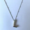 Zilveren ballon letter L hanger halsketting met delicate kralenketting voor dagelijks. - Zilver L