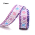 Detailed view of 22mm Christmas snowflake ribbon roll, perfect for DIY gift wrapping. - Size 10 / 3# (22mm)
