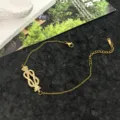 Bracciale dorato con zirconi nodo infinito elegante regalo di gioielli da donna quotidiano - Bracciale a Ferro di Cavallo / Oro