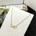 Collana con cuore all'infinito dorato con zirconi cubici brillanti, gioiello elegante. - Stile Combo Cuore Figura 8 Infinito (5949442363856)