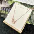 Collana con ciondolo a cavallo a dondolo in oro rosa con zirconi cubici brillanti. - Collana Cavallo Pavè di Strass / Oro rosa