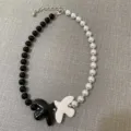 Black and white beaded necklace with ceramic dove pendants, asymmetric pearl chain jewelry. - Black White Dove Black White Pearls