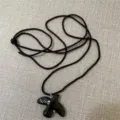 Black ceramic bird pendant necklace with long cord rope, versatile sweater chain accessory. - Black Dove Black Cord