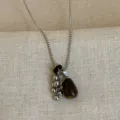 Chique titanium stalen ketting met natuurstenen hanger en mooie metalen kralen. - 2063 Tijgeroog Steen Traan Ketting