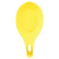 Yellow silicone spoon rest for kitchen counter, heat-resistant ladle holder, easy wash. - Yellow