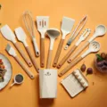 Silicone kitchen utensil set with wooden handles, durable heat resistant cooking tools. - Colander Wooden Handle 13-Piece Set