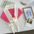 Detailed view of the pink and white color block knitted triangle scarf, warm and cozy neck warmer. - 130*22cm / Rose Pink