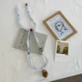 Detailed view of fashionable printed fabric necklace scarf, perfect for stylish shirt matching. - 02#-Diamond Pattern / 48*2cm