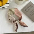 Detailed view of a Japanese retro plaid cartoon puppy cotton square scarf, elegant neck accessory. - Brown Dachshund / 55*55CM