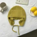 Gorro de punto amarillo para mujer invierno cálido orejeras gorro con cordones trenzados diseño - Talla única / Mostaza