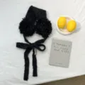 Schwarze Plüsch Ohrenschützer mit langen Bändern, kuschelige warme Winter Ohrenwärmer Damen. - Einheitsgröße / Schwarz