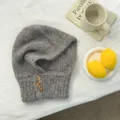 Grey speckled knit alpaca blend balaclava hooded scarf with horn buttons for winter warmth. - Gray