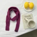Detailed view of cozy purple knit scarf styled with book and lemons on white fabric. - 120x5cm / Purple (07#)