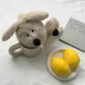 Vue de détail cache-oreilles en peluche duveteuse, accessoire d'hiver confortable beige. - Taille unique / Lapin Marron