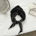 Vintage cotton triangular scarf with floral pattern and green trim. Chic accessory and headband. - Black Flower