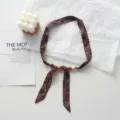 Close-up detail of bohemian paisley print fabric necklace with wooden beads and adjustable tie. - Brown Paisley (11#) / 45x2.5cm
